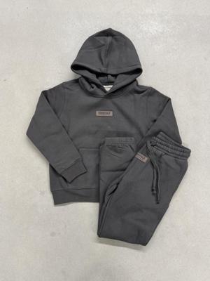 Cou7ure Essentials Rubber Trainingspak Kids Donkergrijs - Maat 128 - Kleur: Donkergrijs | Soccerfanshop