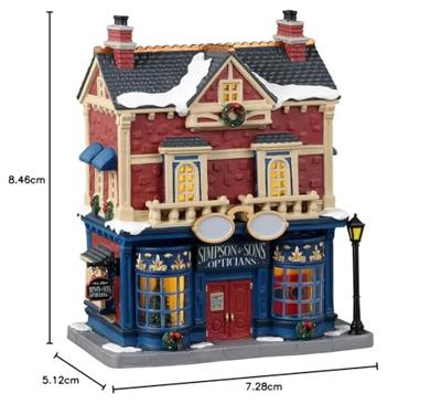 Lemax simpson & sons opticians verlicht kersthuisje Caddington Village 2023
