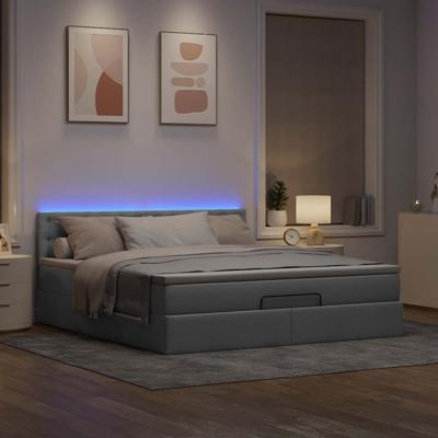 Ottoman bed met matras en LED's 90x190cm stof lichtgrijs