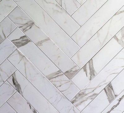 Tegelstroken Statuario mat 10x60 rett