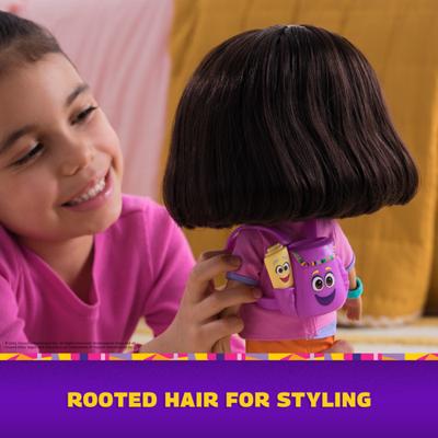 Dora pop met muziek poppenkleding en accessoires - thumbnail