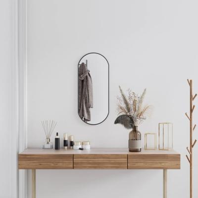 VidaXL Wandspiegel 70x30 cm ovaal zwart