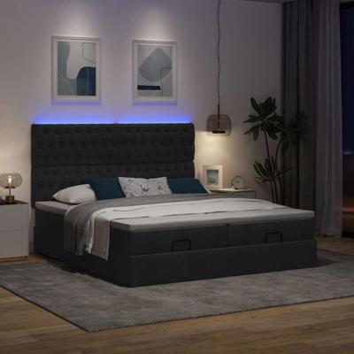 Ottoman bed met matrassen en LED's 200x200cm stof zwart