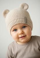 Gebreide muts met oren van biologisch katoen voor kinderen van STERNTALER zandbeige - thumbnail