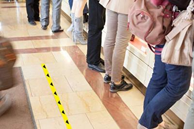 Tarifold vloersticker zonder tekst, ft 50 x 1000 mm, geel met zwarte pijlen