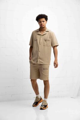 Off The Pitch Double Script Shirt Heren Sand - Maat S - Kleur: Sand | Soccerfanshop Off The Pitch Double Script Shirt Heren Sand - Maat S - Kleur: Sand | Soccerfanshop