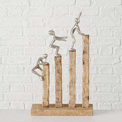 Sculptuur klimmend naar de top Sculptuur klimmend naar de top