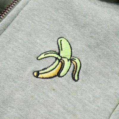 Kindervest met capuchon en rits 92 gemleerd lichtkaki Kindervest met capuchon en rits 92 gemleerd lichtkaki