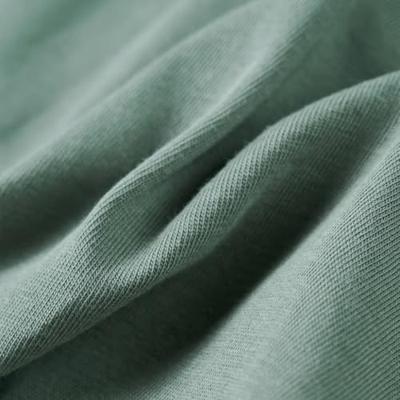 Kindershirt dinosaurusprint 104 kakikleurig Kindershirt dinosaurusprint 104 kakikleurig