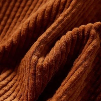 Kinderrok met zakken ribfluweel 104 cognackleurig Kinderrok met zakken ribfluweel 104 cognackleurig