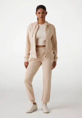 Guess Olympe Trainingspak Dames Beige - Maat S - Kleur: Beige | Soccerfanshop