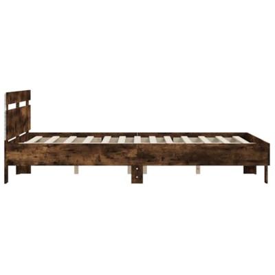 Bedframe met hoofdeinde en LED gerookt eikenkleurig 140x200 cm