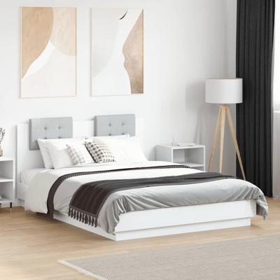 Bedframe met hoofdeinde en LED-verlichting wit 140x190 cm
