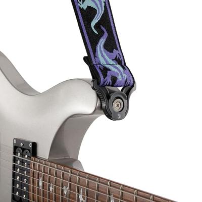 D&apos;Addario Auto Lock Woven Nylon Guitar Strap Teal Lizards gitaarband