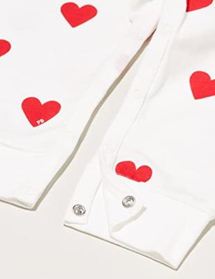 Biologisch katoenen baby pyjama PETIT BATEAU wit hartjesprint