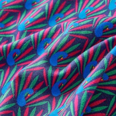 Kinderrok pauwenprint 92 marineblauw