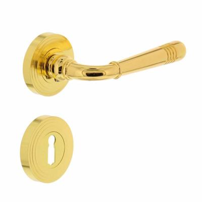 Deurkruk Emily op rozet ø54x9mm met nokken en sleutelgat plaatjes PVD messingkleur Deurkruk Emily op rozet ø54x9mm met nokken en sleutelgat plaatjes PVD messingkleur