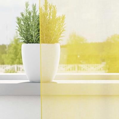 Gordijnen voile met doorvoertules 2 st geel