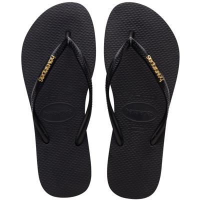Havaianas Slim Logo Metallic black golden Zwart maat 3536 Havaianas Slim Logo Metallic black golden Zwart maat 3536