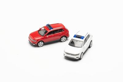 Herpa 013109-002 H0 Auto Volkswagen Tiguan met waarschuwingsbalk, rood en wit