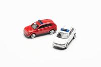 Herpa 013109-002 H0 Auto Volkswagen Tiguan met waarschuwingsbalk, rood en wit - thumbnail