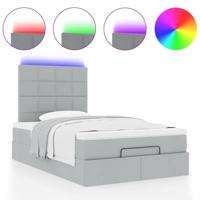 Ottoman bed met matras en LED's 120x200cm stof lichtgrijs - thumbnail