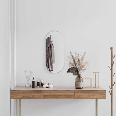 VidaXL Wandspiegel 70x30 cm ovaal zilverkleurig VidaXL Wandspiegel 70x30 cm ovaal zilverkleurig