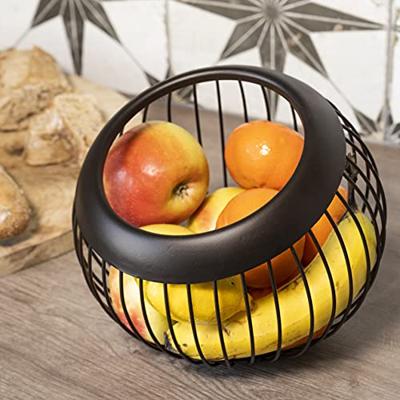 QUVIO Ronde fruitschaal metaal - Zwart met een bruine gloed