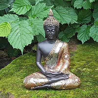 Boeddha in zwart/goud van poly, B21 x D12 x H27 cm.