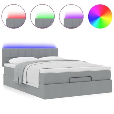 Ottoman bed met matras en LED's 140x200cm stof lichtgrijs