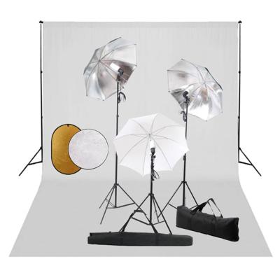 Fotostudioset met lampen, paraplu's, achtergrond en reflector