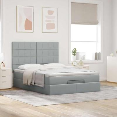 Ottoman bed met matras en LED's 140x190cm stof lichtgrijs