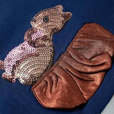 Kindertrui met eekhoorns van pailletten 104 marineblauw