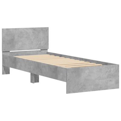 Bedframe met hoofdeinde en LED betongrijs 140x200 cm