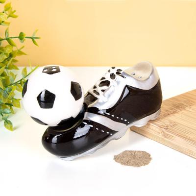 Voetbalschoen en bal peper- en zoutstel