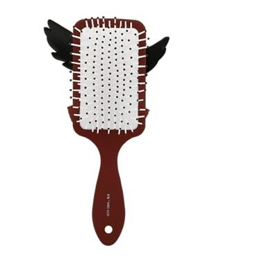 Harry Potter haarborstel met 3D-applicatie Hedwig in siliconen bordeauxrood Harry Potter haarborstel met 3D-applicatie Hedwig in siliconen bordeauxrood