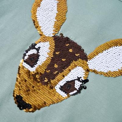 Kindershirt met lange mouwen hert van pailletten 104 middelmintkleurig Kindershirt met lange mouwen hert van pailletten 104 middelmintkleurig