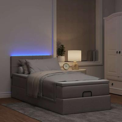 Ottoman bed met matras en LED's 120x200cm stof taupe