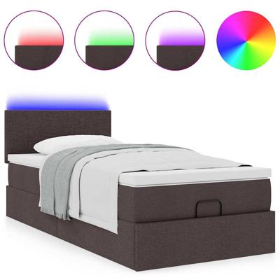 Ottoman bed met matras en LED's 140x200cm stof donkerbruin