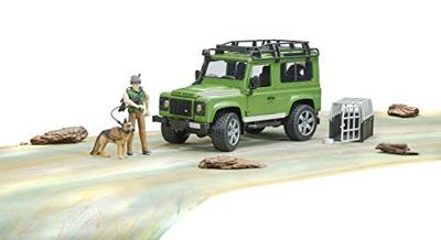 Land Rover Defender Station Wagon met boswachter en hond van Bruder - thumbnail