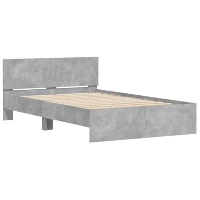 Bedframe met hoofdeinde en LED betongrijs 140x190 cm