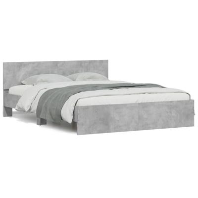Bedframe met hoofdeinde betongrijs 140x190 cm