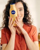 Body Lotion Nivea Q10+ Zelfbruinende [Lotion / Spray / Melk] Q10+ - thumbnail