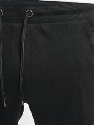Urban Classics / joggingbroek Cutted Terry in zwart Urban Classics / joggingbroek Cutted Terry in zwart