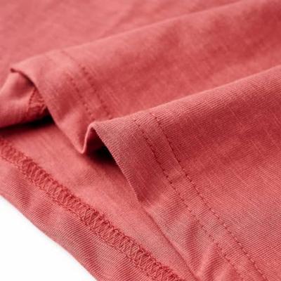 Kindershirt 140 paprikakleurig Kindershirt 140 paprikakleurig