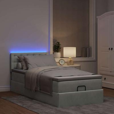 Ottoman bed met matras en LED's 120x200 cm fluweel lichtgrijs - thumbnail