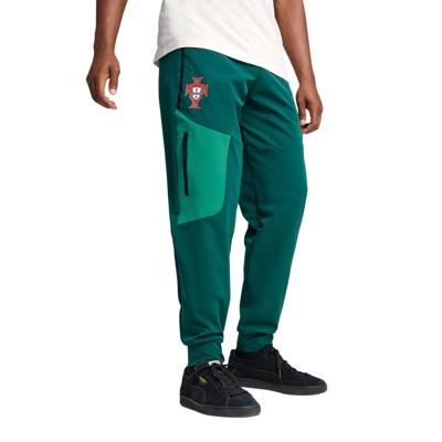 PUMA Portugal Pumatech Woven Trainingsbroek 2025-2026 Donkergroen Groen Wit PUMA Portugal Pumatech Woven Trainingsbroek 2025-2026 Donkergroen Groen Wit