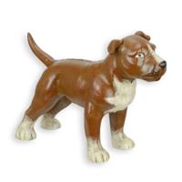 A CAST IRON FIGURINE OF A STAFFORDSHIRE TERRIËR