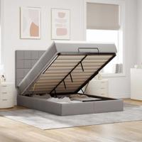 Ottoman bed met matras en LED's 140x200cm stof taupe