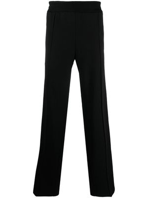Versace pantalon de jogging à logo brodé - Noir